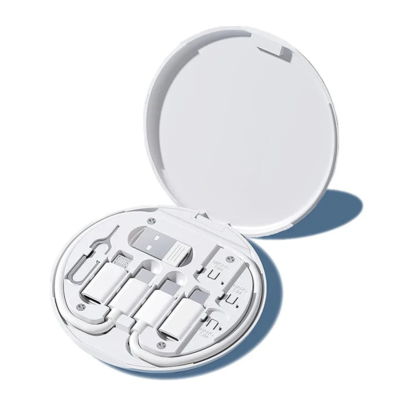 Open white compact mirror with multiple compartments on a white background