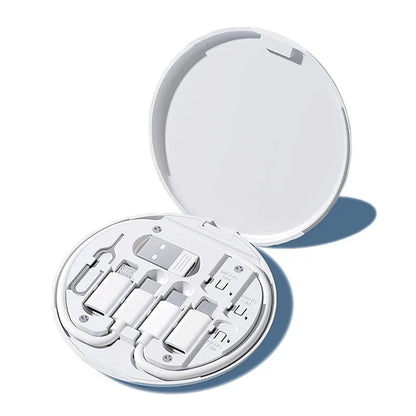 Open white compact mirror with multiple compartments on a white background